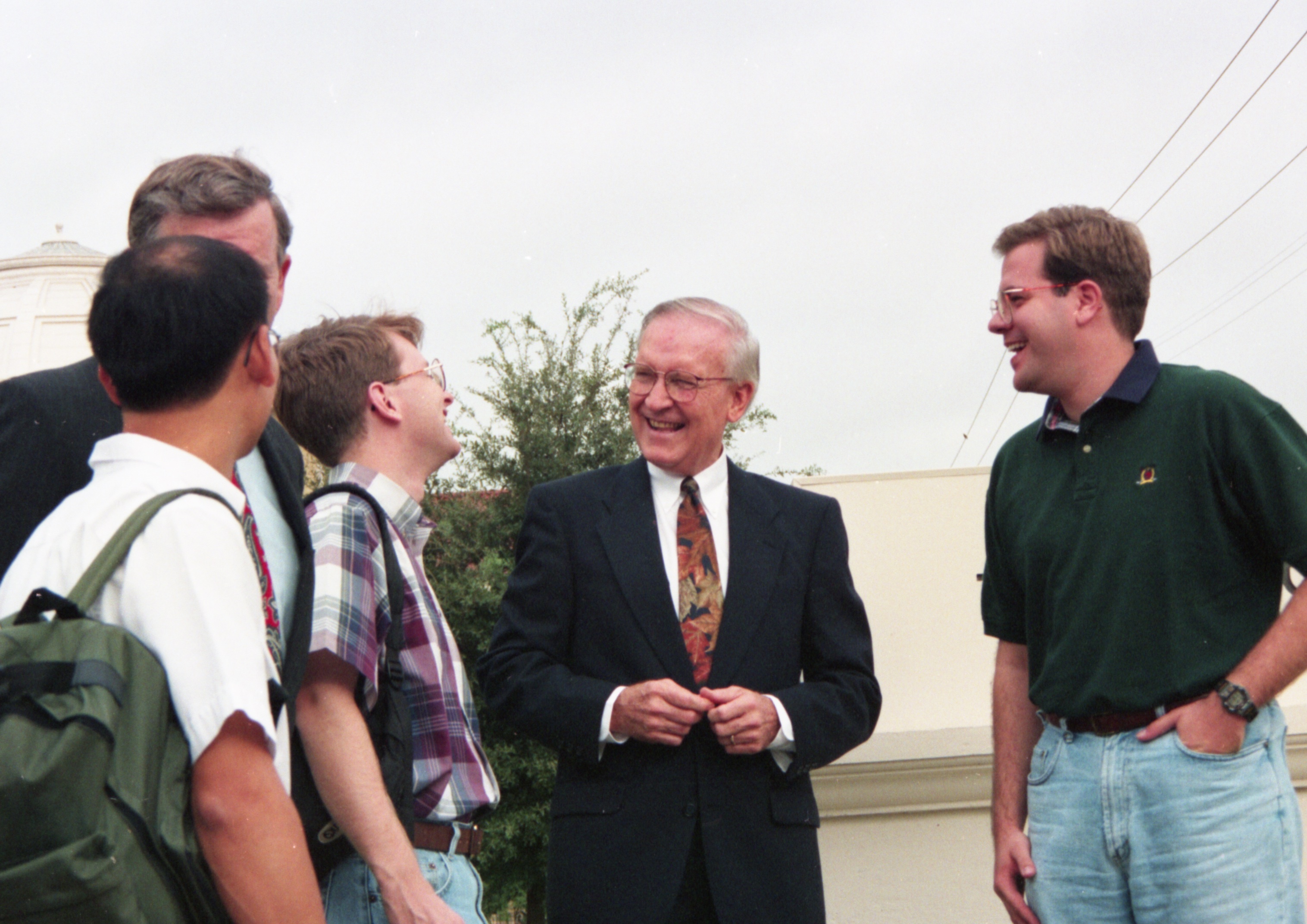 Russell H. Dilday outside of Truett Theological Seminary with students.Photo property of the Texas Baptist Historical Collection. 