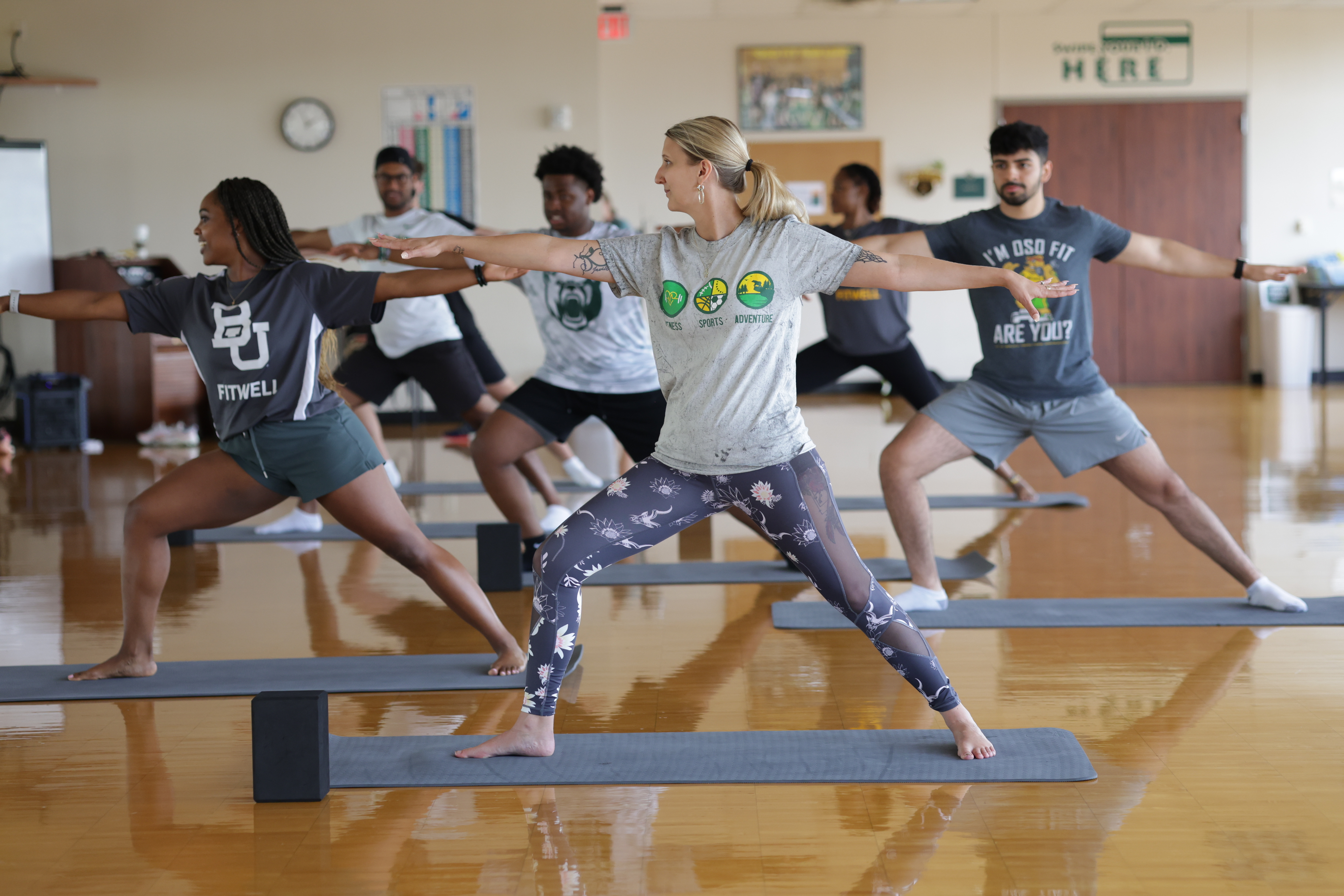 A group of Baylor students practice yoga. 