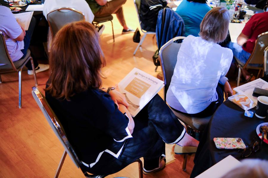 Person at Bridge to Belonging event.